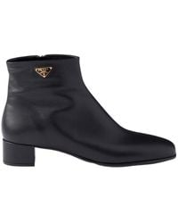 Prada - Triangle-Logo Zipped Ankle Boots - Lyst