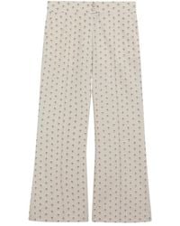 Valentino - All-Over Patterned Flared Pants - Lyst