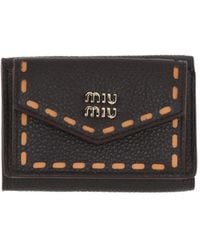Miu Miu - Flip Wallet - Lyst