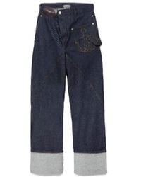JW Anderson - Jw Anderson Twisted Turn-Up Workwear Denim Jeans - Lyst