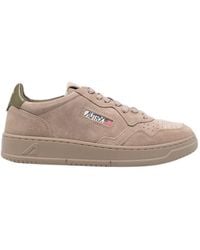Autry - Perforated Logo-Patch Sneakers - Lyst