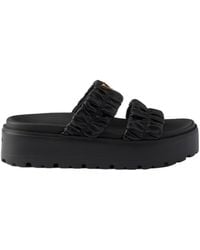 Prada - Matelassé Nappa Leather Flatform Slides - Lyst