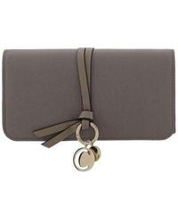 Chloé - Chloé Logo Charm Laced Wallet - Lyst