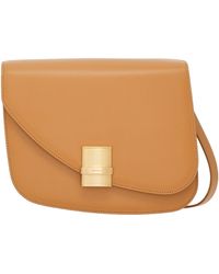 Ferragamo - Ferragamo Logo-Plaque Asymmetric Medium Crossbody Bag - Lyst