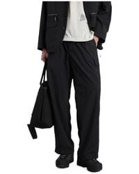 and wander - Belted Cargo Pants - Lyst