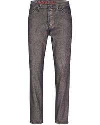 BOSS - Solid Color Tapered Fit Slim Jeans - Lyst