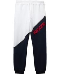 Versace - Logo-Embroidered Panelled Track Pants - Lyst