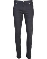 McQueen - Logo Embroidered Slim Jeans - Lyst
