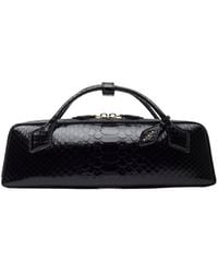 Alaïa - Alaïa Textured Top Handle Clutch Bag - Lyst