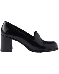 Prada - Triangle-Logo Heeled Loafers - Lyst