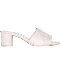 McQueen - The Seal Embossed Slip-On Sandals - Lyst