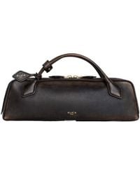 Alaïa - Alaïa Le Teckel Zipped Clutch Bag - Lyst
