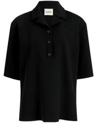 KHAITE - Notched Collar Short Sleeve Polo Top - Lyst