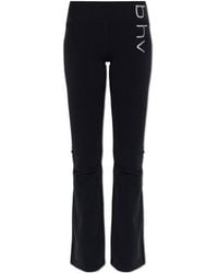 MISBHV - Logo Printed Flared Leggings - Lyst