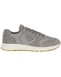 Prada - Logo-Plaque Suede-Panelled Sneakers - Lyst