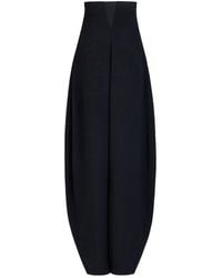 Alaïa - High-Rise Curved-Leg Trousers - Lyst