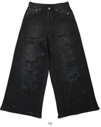Vetements - Distressed Wide Leg Jeans - Lyst