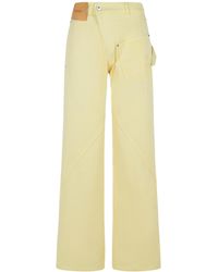 JW Anderson - Jw Anderson Logo Patch Twisted Leg Pants - Lyst