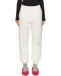 Undercover - X Champion Logo-Patch Track Pants - Lyst