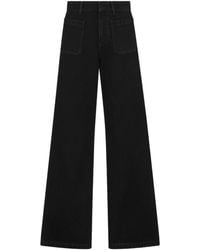 Dior - Flared Jeans - Lyst