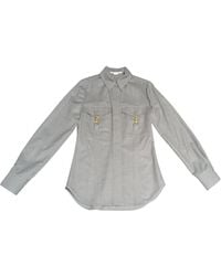 Stella McCartney - Clasp-Embellished Curved Hem Shirt - Lyst