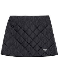 Prada - Triangle-Logo Quilted Mini Skirt - Lyst