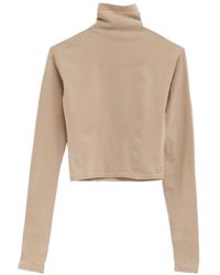 Alaïa - Alaïa Roll-Neck Cropped Top - Lyst
