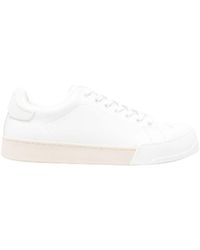 Marni - Logo Debossed Low-Top Sneakers - Lyst