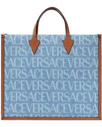 Versace - Allover-Printed Denim Top Handle Bag - Lyst