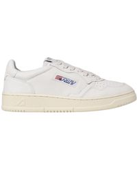 Autry - Logo-Patch Low-Top Sneakers - Lyst