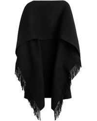 TOTEME - Totême Fringed Knitted Poncho - Lyst