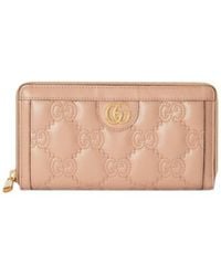 Gucci - Logo Plaque Quilted Zipped Wallet - Lyst