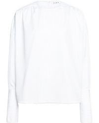 Alaïa - Alaïa Ruched Long-Sleeved Top - Lyst