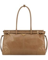 Prada - Triangle-Logo Drawstring Shoulder Bag - Lyst