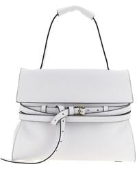 Moschino - Logo Embossed Shoulder Bag - Lyst