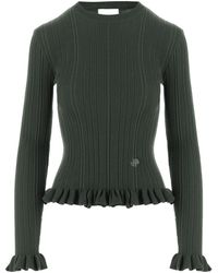 Patou - Ruffled Hem Ribbed Knitted Sweater - Lyst