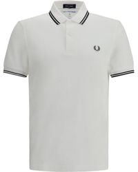 Comme des Garçons - Comme Des Garçons Shirt X Fred Perry Text-Printed Polo Shirt - Lyst