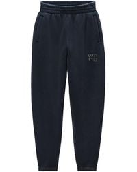 Alexander Wang - T By Logo Embellished Tapered Pants - Lyst