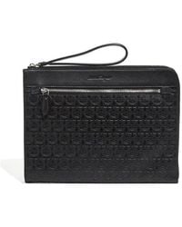 Ferragamo - Ferragamo Gancini Embossed Zip-Up Clutch Bag - Lyst