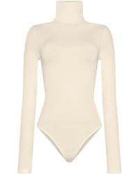 Wolford - Colorado High-Neck Bodysuit - Lyst