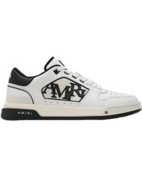 Amiri - Logo Embossed Low-Top Sneakers - Lyst