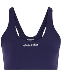 Sporty & Rich - Logo-Print Stretch-Jersey Sports Bra - Lyst