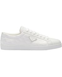 Prada - Triangle-Logo Round-Toe Lace-Up Sneakers - Lyst