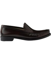 Prada - Logo-Debossed Ruched Loafers - Lyst