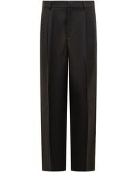 Versace - Logo-Patch Tailored Trousers - Lyst