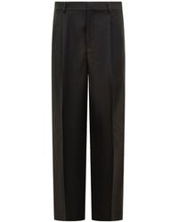 Versace - Logo-Patch Tailored Trousers - Lyst