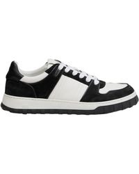 Ami Paris - Ami Logo Embossed Low-Top Sneakers - Lyst