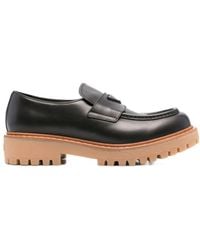 Prada - Logo Plaque Round Toe Loafers - Lyst