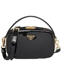 Prada - Odette Zip-Up Mini Handbag - Lyst