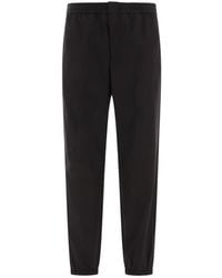 Prada - Drawstring Monochrome Pants - Lyst